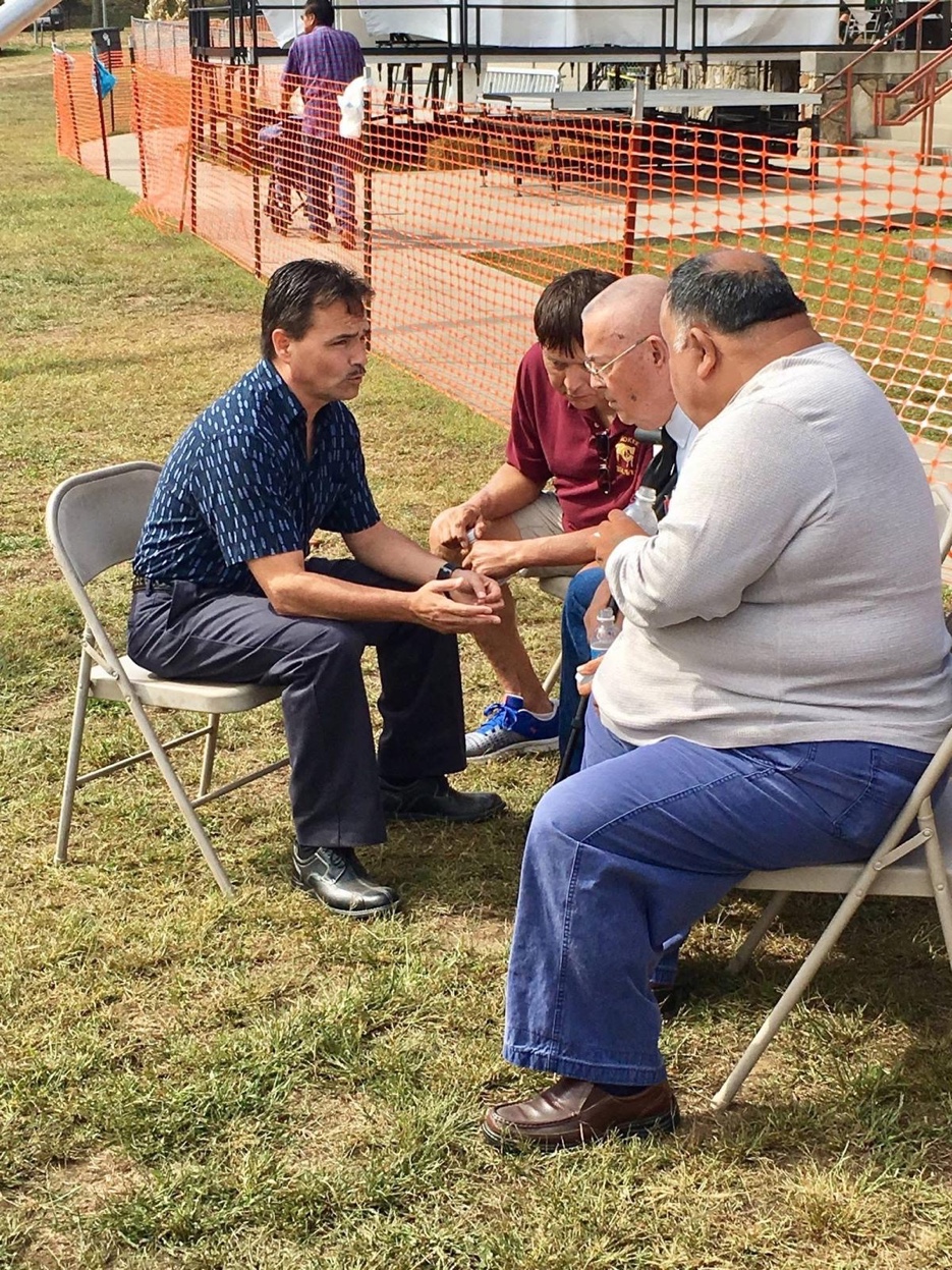 Patrick Lambert with pastors Foreman Bradley, Bo Parris, and Denny Crowe at a community event